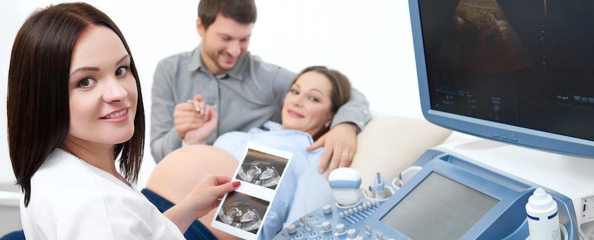 ultrasound technician showing result of the test 